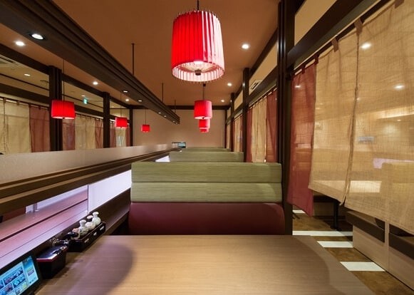 回転寿司店「マルマン鮨」